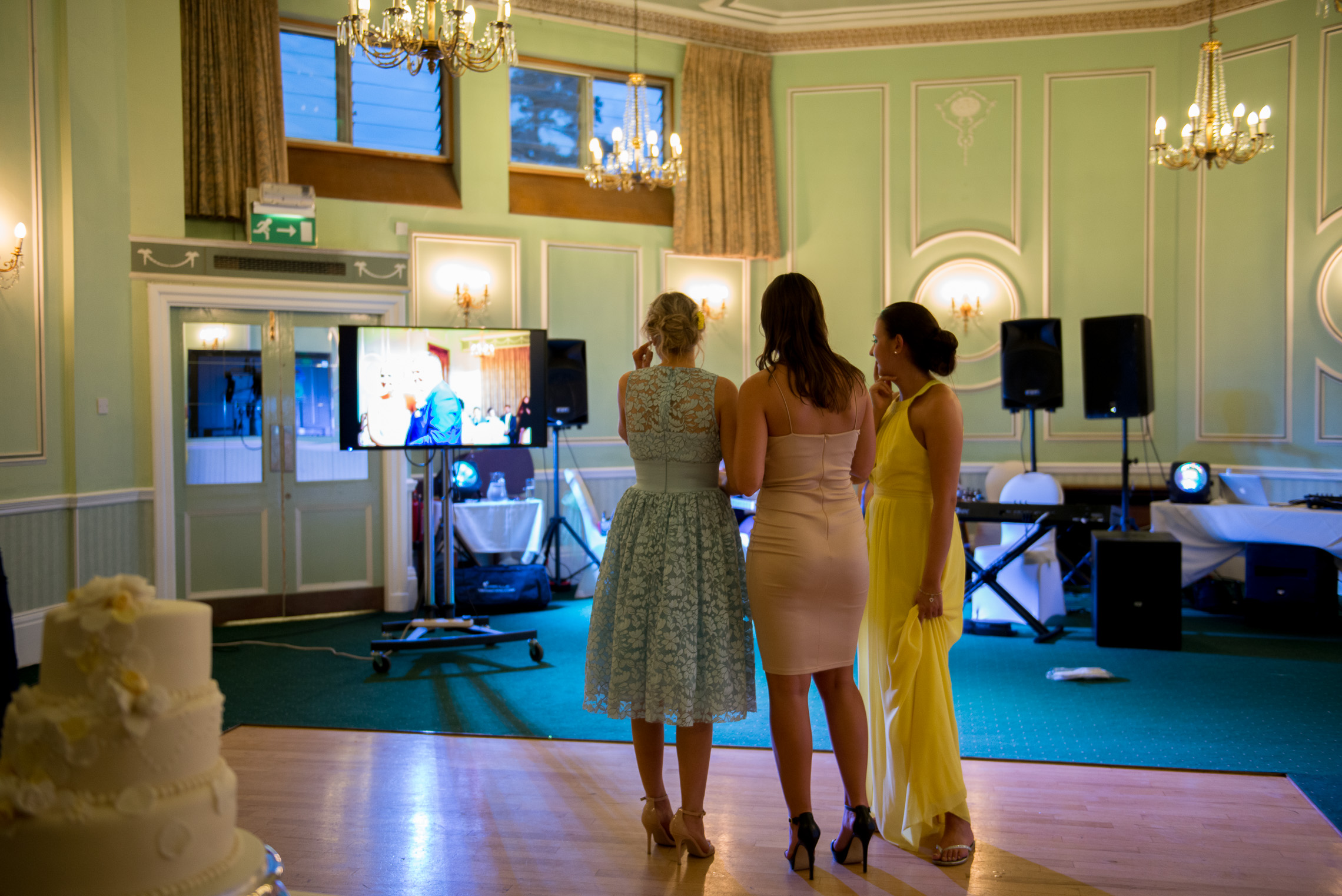 Guests look on at some of the pictures during the day
