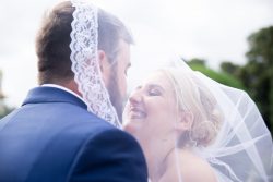 Bride and Groom under the veil