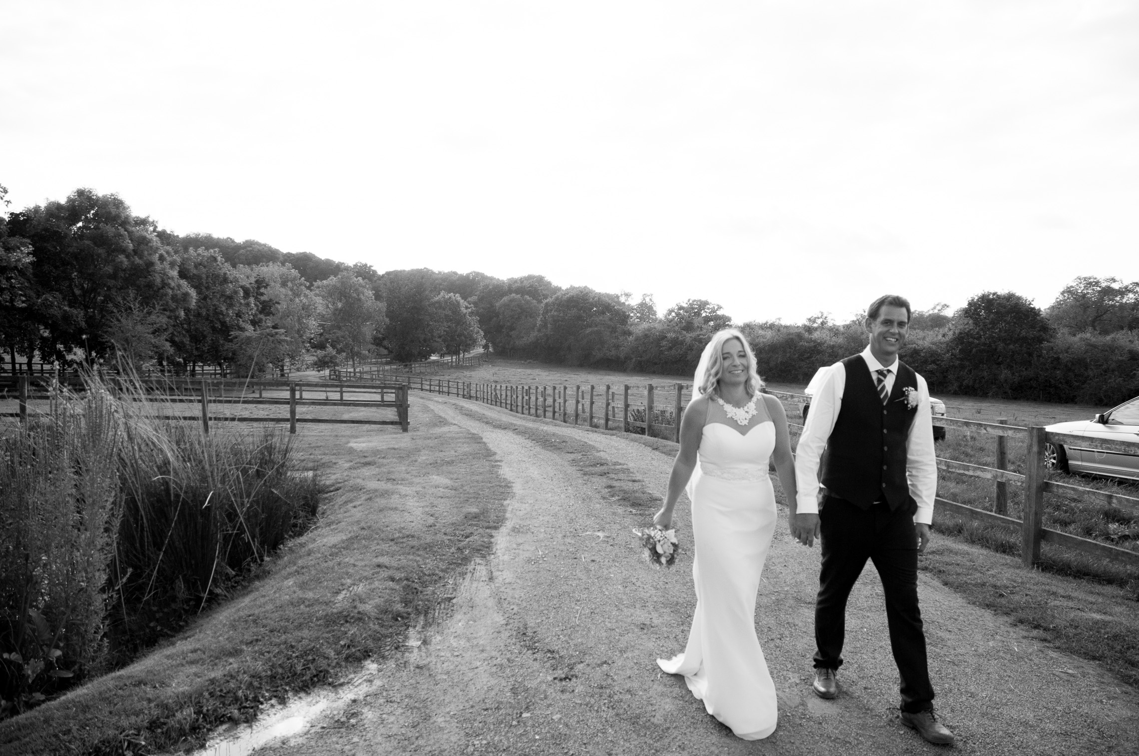 Bride and groom take a relaxing walk