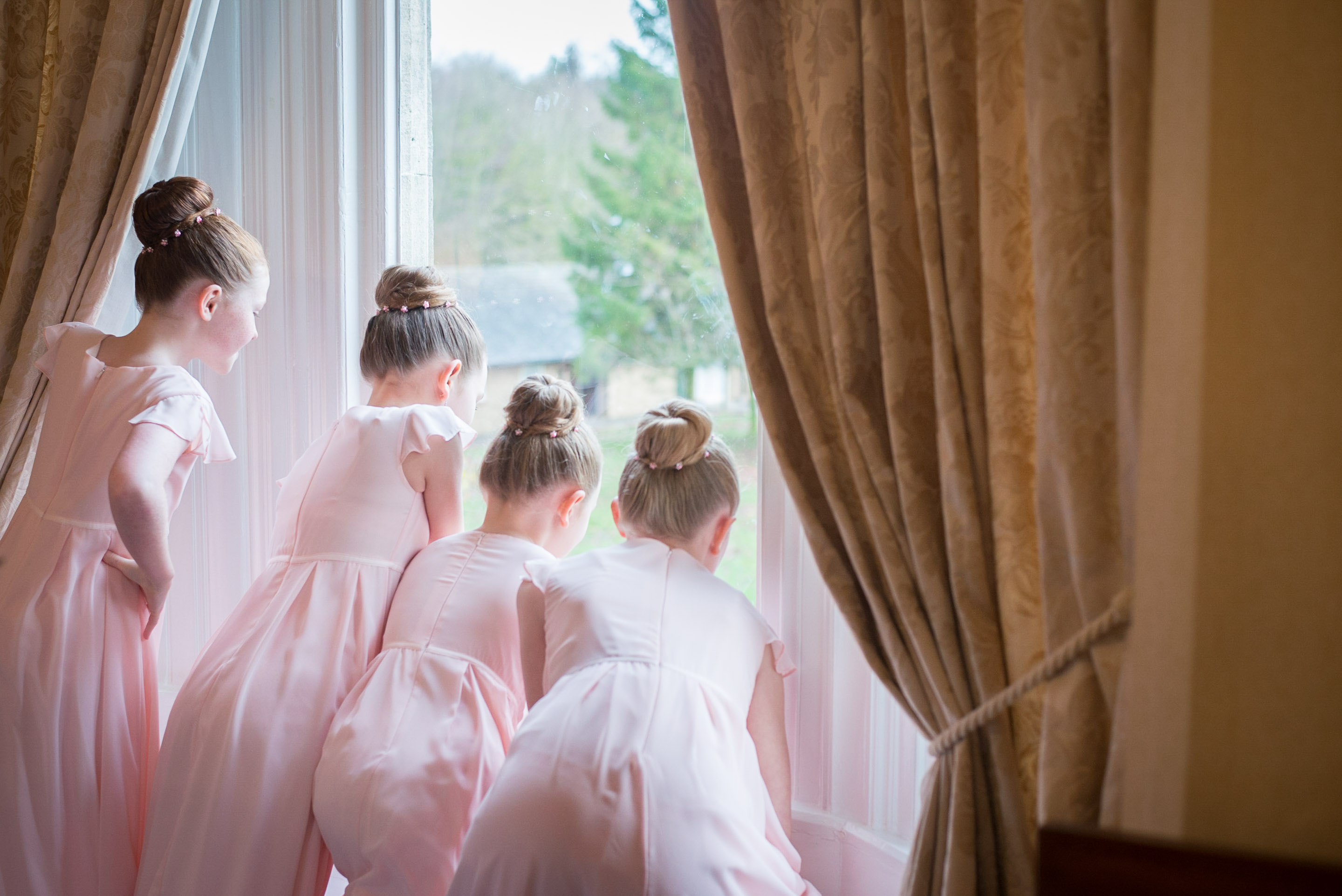 Bridesmaids by the window