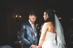 Love the light, Making the vows at the stunning highgate house baronial hall, wedding photography