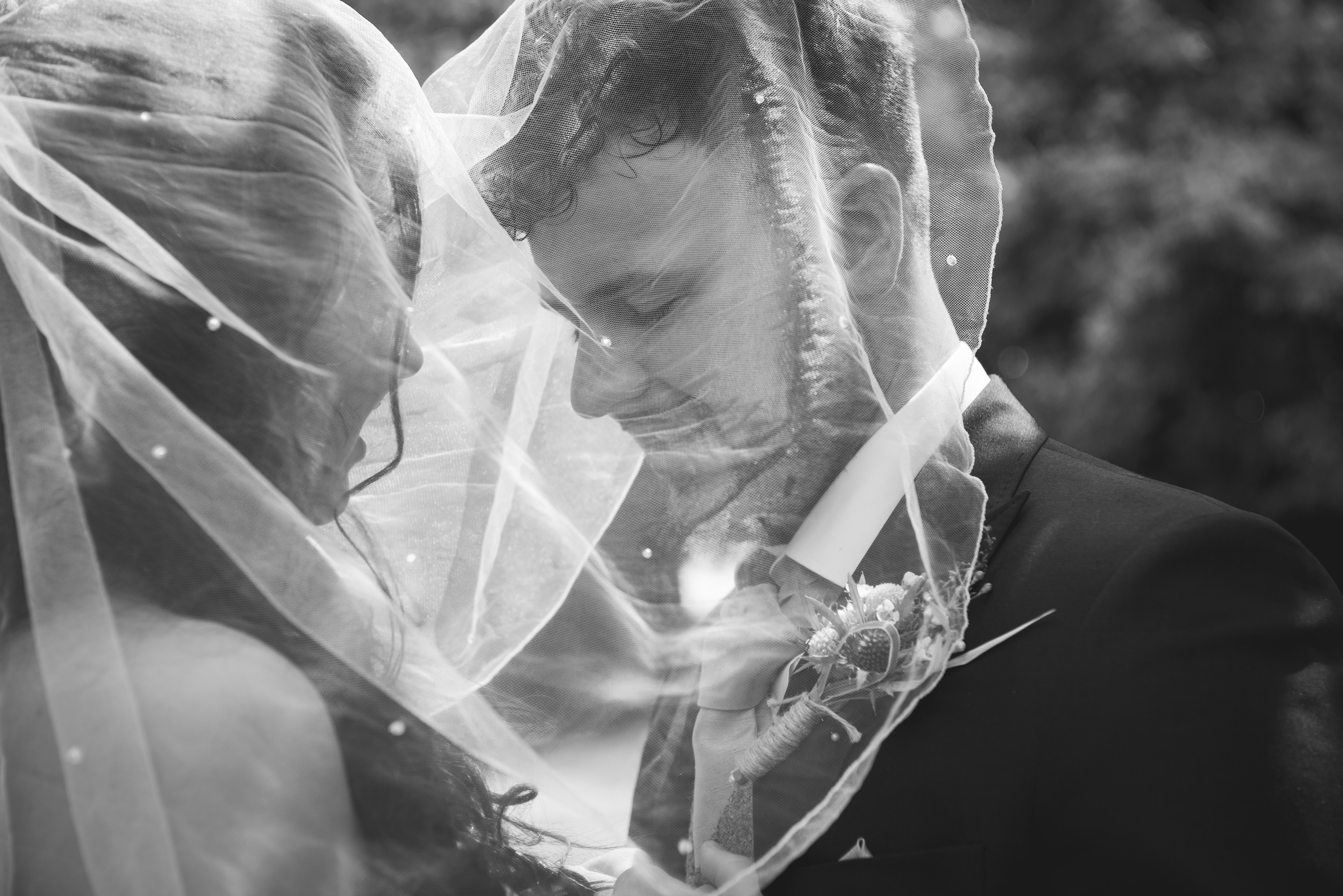 Through the veil, veil shot, wedding photography, love is bliss, romantic