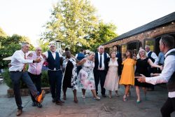 Dancing guests at wedding