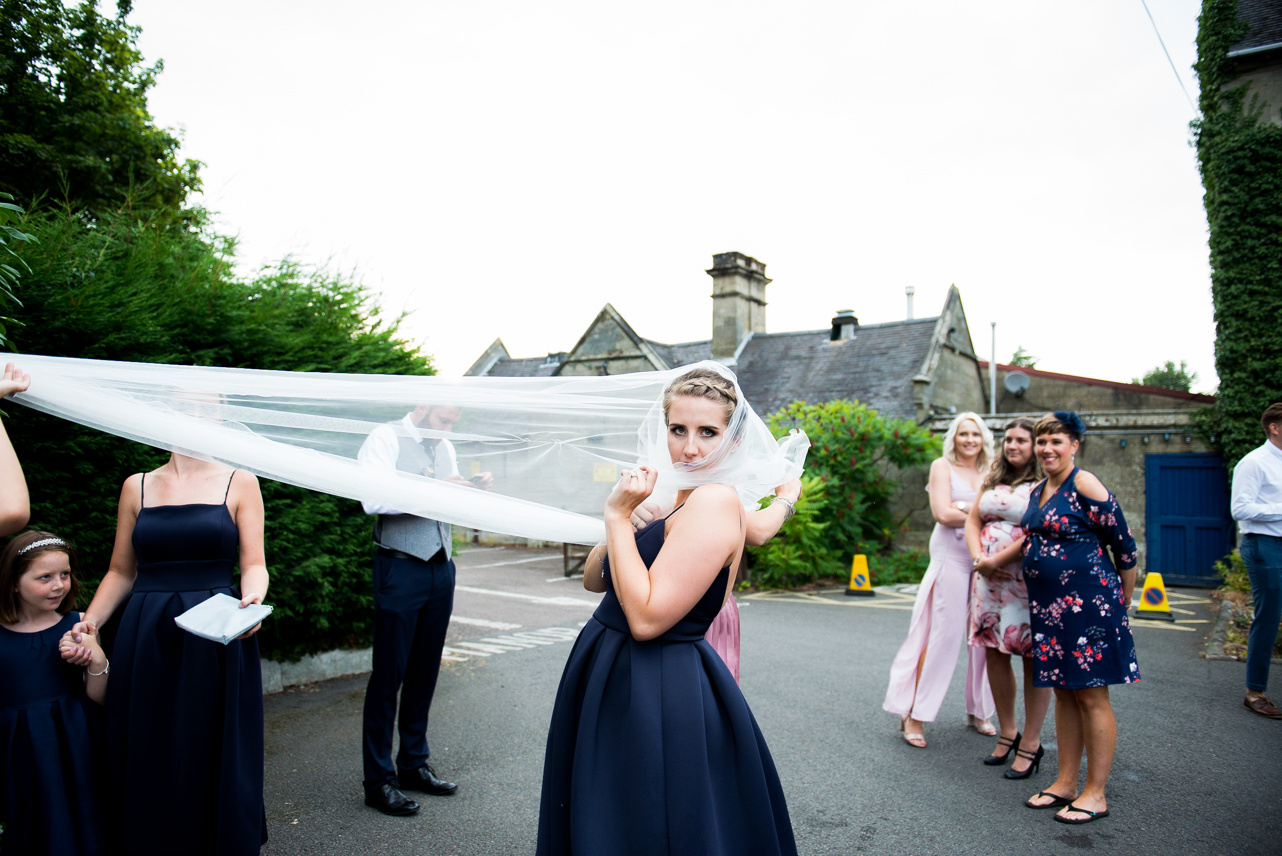 Bridesmaid loving the veil