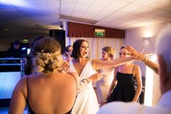 Bride dancing at evening reception