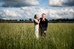 Couple image in a field just outside Swallows nest barn